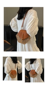 Detail of woven straw bucket bag featuring brown leather flap and gold tassel accents