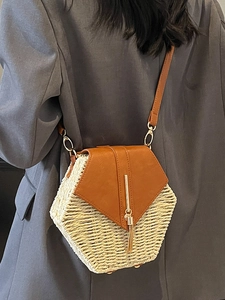 Handmade hexagonal straw crossbody bag with brown leather flap and stylish tassel detail