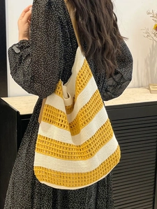 Large woven tote bag with yellow and cream stripes for beach or commute holiday use