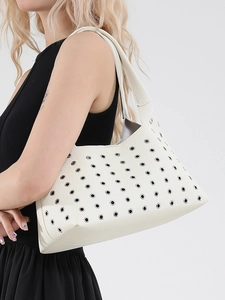 White rivet shoulder bag in lychee leather featuring punk style silver grommets for women