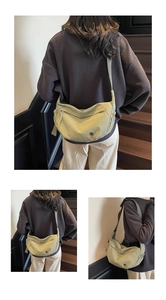 Detailed views of a light green hobo crossbody bag with adjustable wide shoulder straps