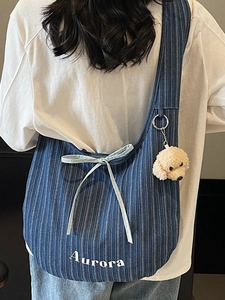 Blue striped denim tote bag with Aurora embroidery and cute poodle charm pendant