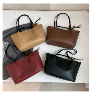 Minimalist large tote bags in four colors with decorative wooden bead charms