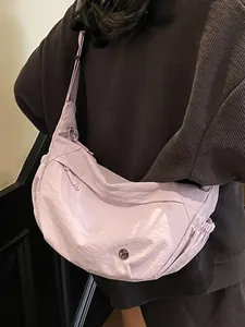 Minimalist light purple crescent crossbody bag in waterproof nylon fabric for women