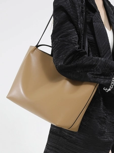 Minimalist large capacity khaki tote bag for women shown as a stylish shoulder bag