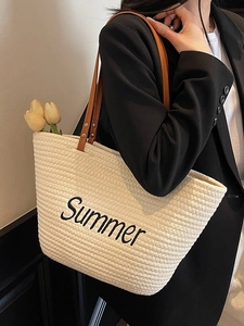 Large summer straw woven tote bag with brown handles and black Summer embroidery