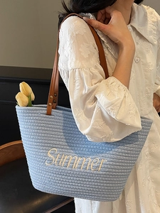 Large blue straw tote bag with Summer embroidery and stylish brown faux leather handles