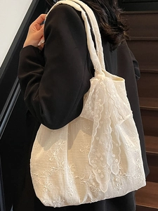 Elegant off-white lace flower tote bag with large bow decoration for daily commute
