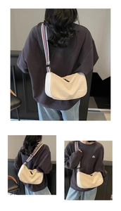 Multiple views of a beige canvas dumpling bag with sporty striped wide shoulder strap