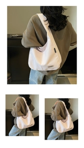 Close-up of minimalist large capacity lavender hobo bag with durable wide shoulder strap