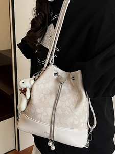 Elegant floral jacquard bucket bag with drawstring chain and heart pearl pendant
