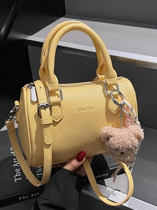 Yellow litchi pattern Boston handbag with double handles and cute pink bear charm