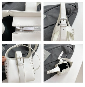 Détails des rivets argentés et de la fermeture éclair sur le sac en cuir PU blanc