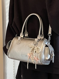Silver mirror metallic bowling bag with pearl bow charm and adjustable strap