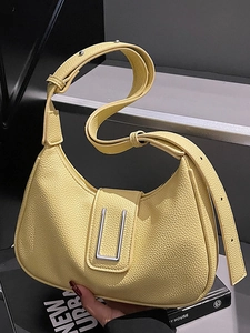 Sac hobo jaune clair style français en cuir motif litchi avec boucle argentée en U
