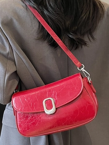 Fashionable red crackle leather shoulder bag for women with silver oval buckle detail