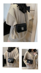 Three-way view of minimalist black crossbody bag with adjustable strap and silver buckle