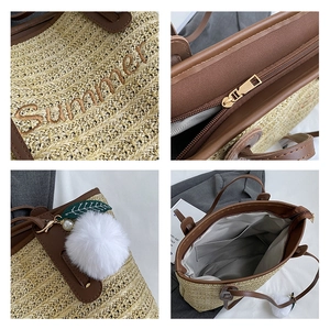 Detailed view of straw tote with Summer embroidery, brown leather trim and golden zipper