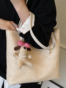 Handmade beige straw tote bag with white leather straps and cute puppy pendant