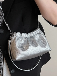 Silver pleated dumpling crossbody bag with metallic texture and chain strap for women
