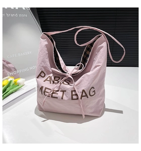 Pink PARIS tote bag with bow detail, dark plaid lining and embroidery on high quality fabric