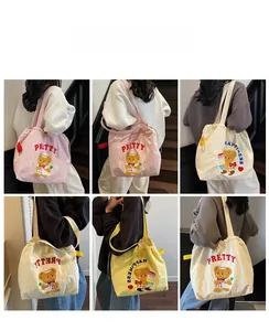 Detail shots of various cute teddy bear tote bags with drawstrings and embroidery