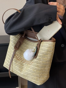 Summer straw tote bag with brown leather trim and 'Summer' embroidery detail