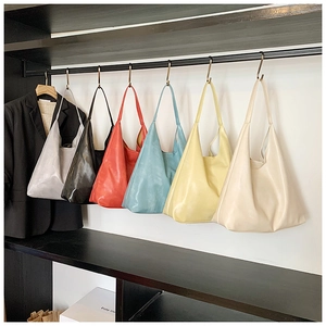 Multiple Maillard style tote bags in six colors hanging on a rack for fashion display