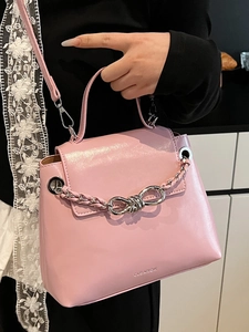 Pink matte leather crossbody bag with silver chain and bow knot for women