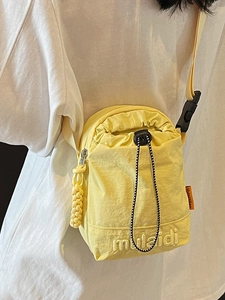 Japanese style lightweight yellow drawstring crossbody bag for casual outdoor commuting