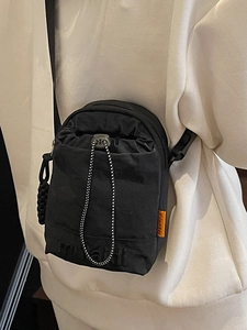 Japanese style black nylon drawstring crossbody bag for casual outdoor sports and daily commute