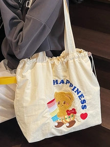 Large beige canvas tote bag with cute cartoon bear embroidery for daily commuting