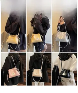 Detailed comparison of seashell crossbody bags in yellow, blue, pink, and white leather