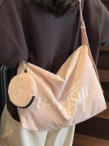 Pink large capacity canvas crossbody bag for women featuring a detachable small round coin purse