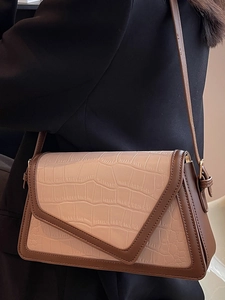 Fashionable stone pattern shoulder bag in beige and brown contrast leather