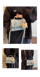 Detail of light blue crossbody bag with star metal buckle and cute bear pendant