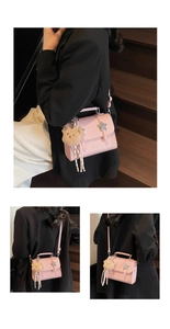 Pink leather crossbody bag detail with silver star charm and plush bear pendant accessory