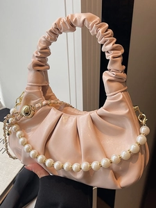 Pink pleated cloud bag for women featuring decorative pearl chain and soft PU leather