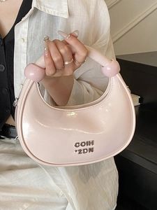 Pink pearl gloss leather crescent hobo bag with silver logo and decorative beads
