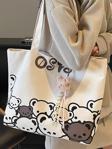 Canvas tote bag with cute cartoon bear prints and plush pendant for daily commuting
