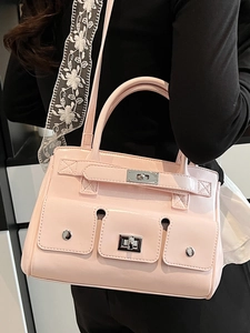 Pink patent leather tote bag with silver metal lock and cross-body strap for women