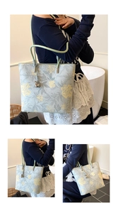 Close-up of floral bucket bag with light green prints and silver rose charm detail