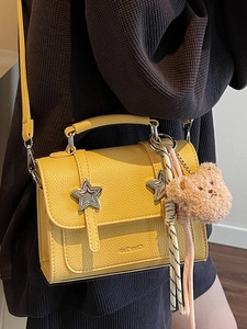 Sweet yellow lychee grain crossbody bag with star decor and plush bear charm