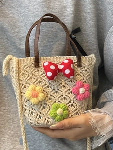 Floral crochet woven tote bag with 3D flowers and Minnie-style polka dot bow decoration