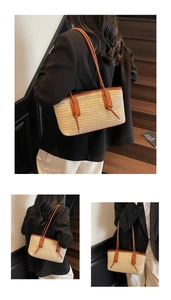 Detail of light beige woven straw tote bag with brown leather handles and knot design