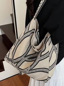 Chic beige canvas hobo tote bag with black geometric chain pattern for women's commuting