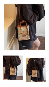 Detail of the multi-colored striped woven mini bag with brown faux leather handles and strap