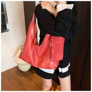 Large red hobo tote bag in matte synthetic leather with matching detachable side pouch