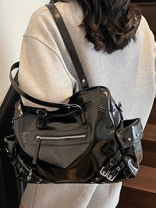 Retro black glossy leather tote bag with functional pockets and rivet details for women