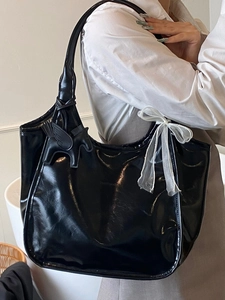 Glossy black oil wax leather tote bag with pegasus charm and lace bow decoration